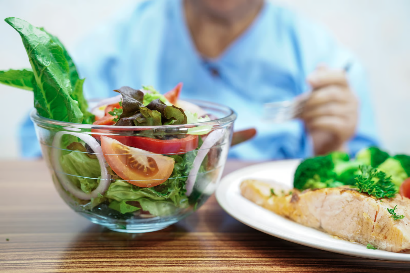 Diet before surgery featuring a balanced meal of salad, vegetables and lean protein as part of a healthy pre-surgery nutrition plan.